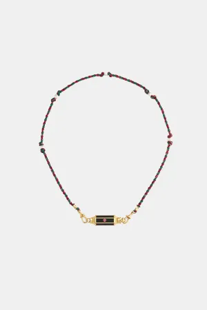 MARIE LICHTENBERG | 18K GOLD EBONY BABY LOCKET NECKLACE