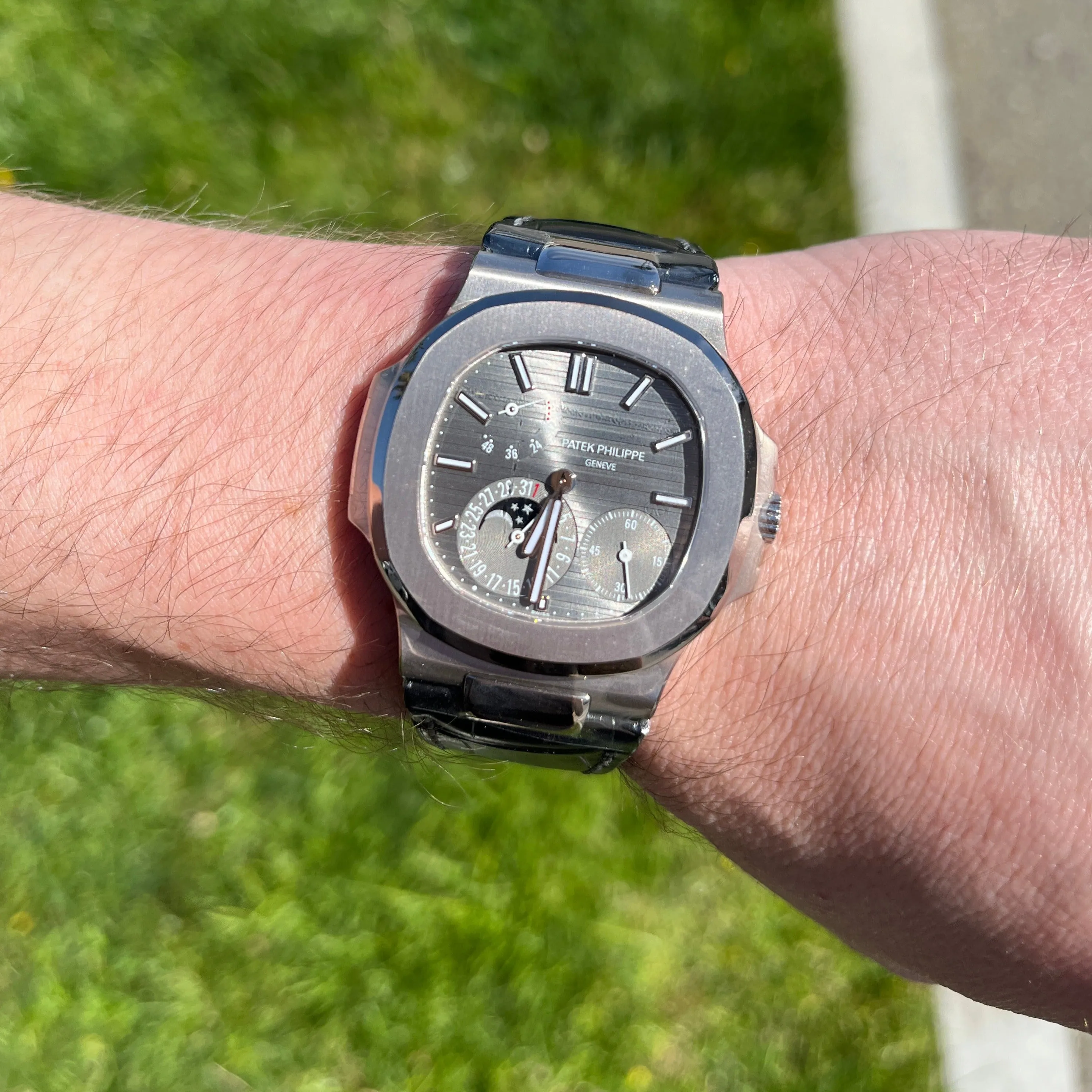 Patek Philippe Men's Nautilus White Gold 40mm Slate Grey Moonphase Dial Watch Reference #: 5712G-001